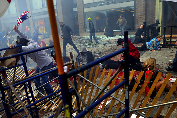 The scene moments after an explosion near the finish line of the Boston Marathon. The Associated Press (click on photo to enlarge)