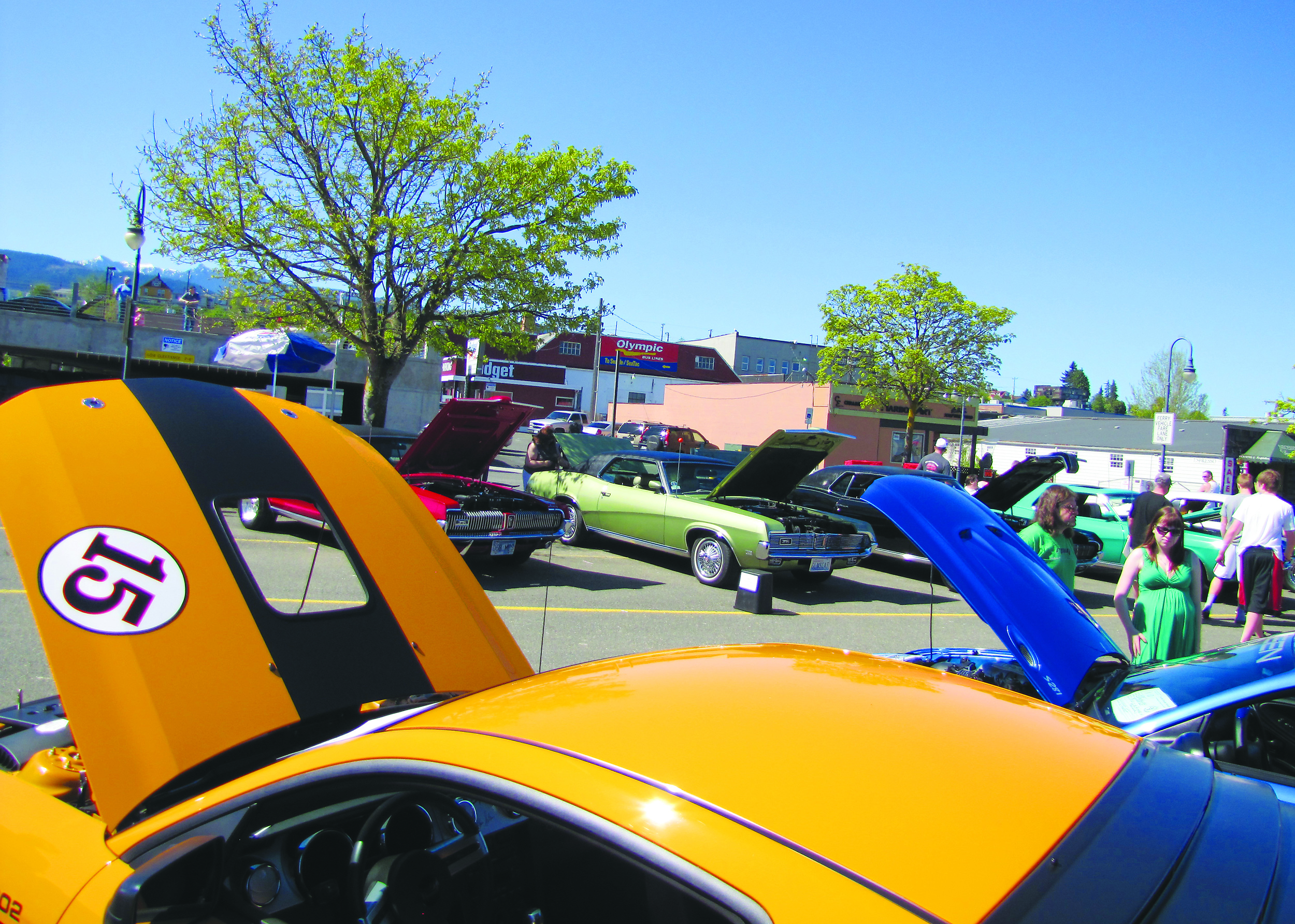 Ford Mustang Shelbys and Mercury Cougars brought out car-lovers and sun-worshippers on a hot and sunny Sunday in downtown Port Angeles. Arwyn Rice/Peninsula Daily News