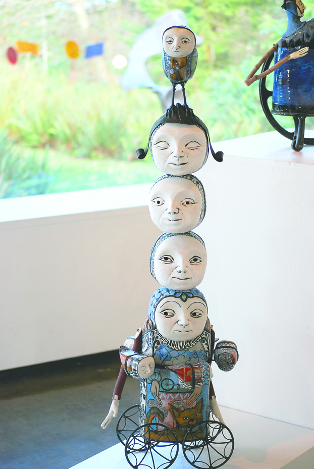 Sculptures such as this one by John and Robin Gumaelius are part of the Art in Bloom art-and-flowers show at the Port Angeles Fine Arts Center today through Sunday. Diane Urbani de la Paz/Peninsula Daily News