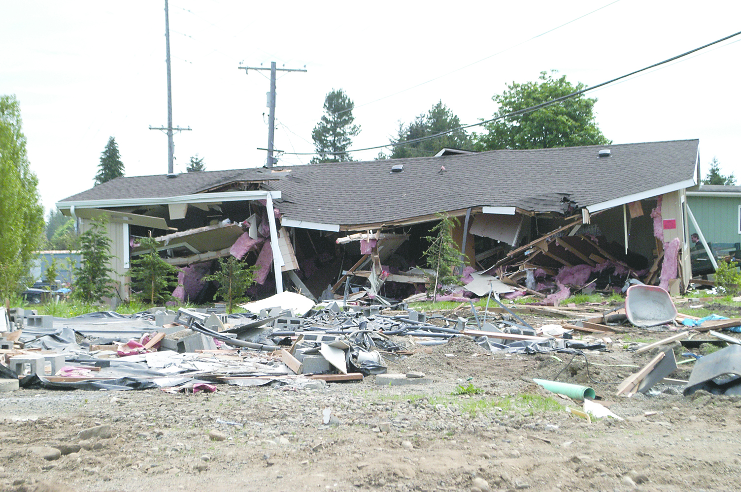 This manufactured home owned by Dan Davis was among those damaged in Gales Addition last Friday. Jeremy Schwartz/Peninsula Daily News