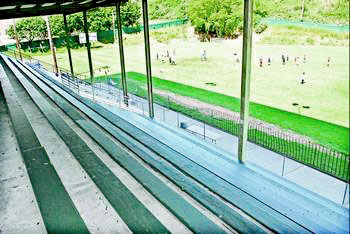The bench-like bleachers at Memorial Field. —Peninsula Daily News photo
