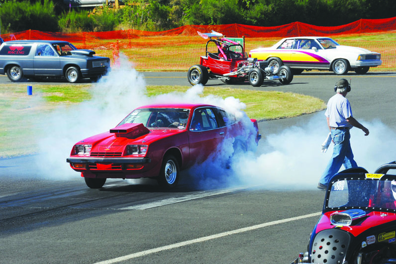 Dragsters queue up at the starting line at last year's drag races put on by West End Thunder at Forks Municipal Airport. Lonnie Archibald/for Peninsula Daily News