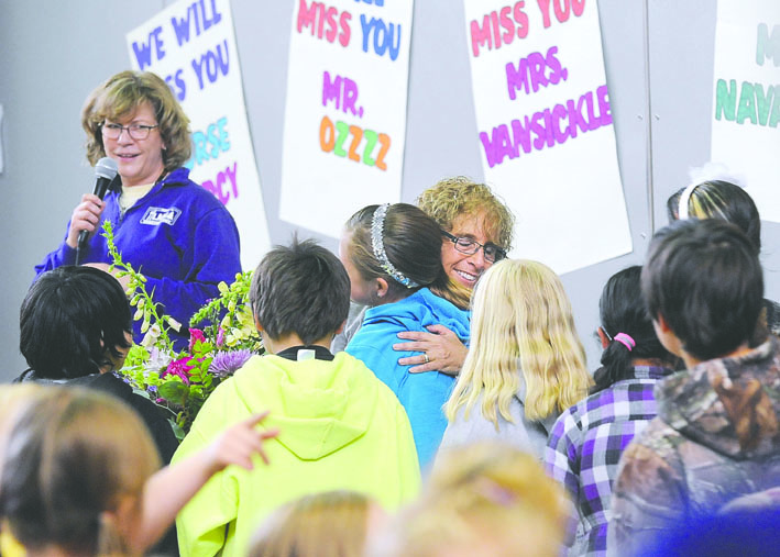 Students line up at an assembly earlier this month to say goodbye to Lisa Navarro