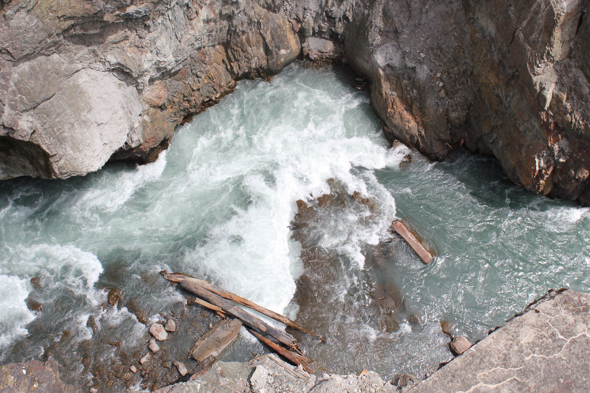 Much of the remaining 30 feet of Glines Canyon Dam was covered in water today