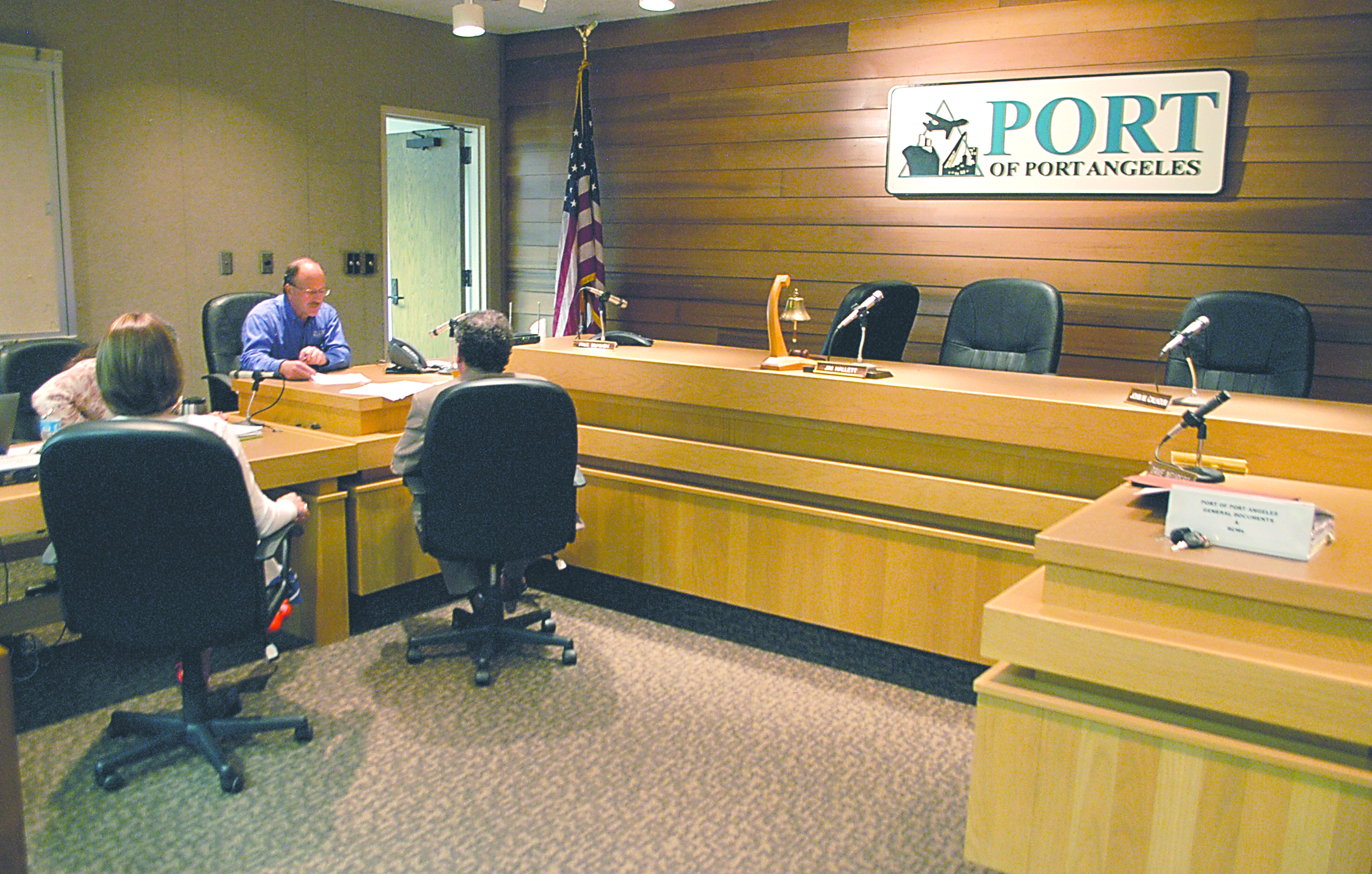 Three empty commissioner chairs