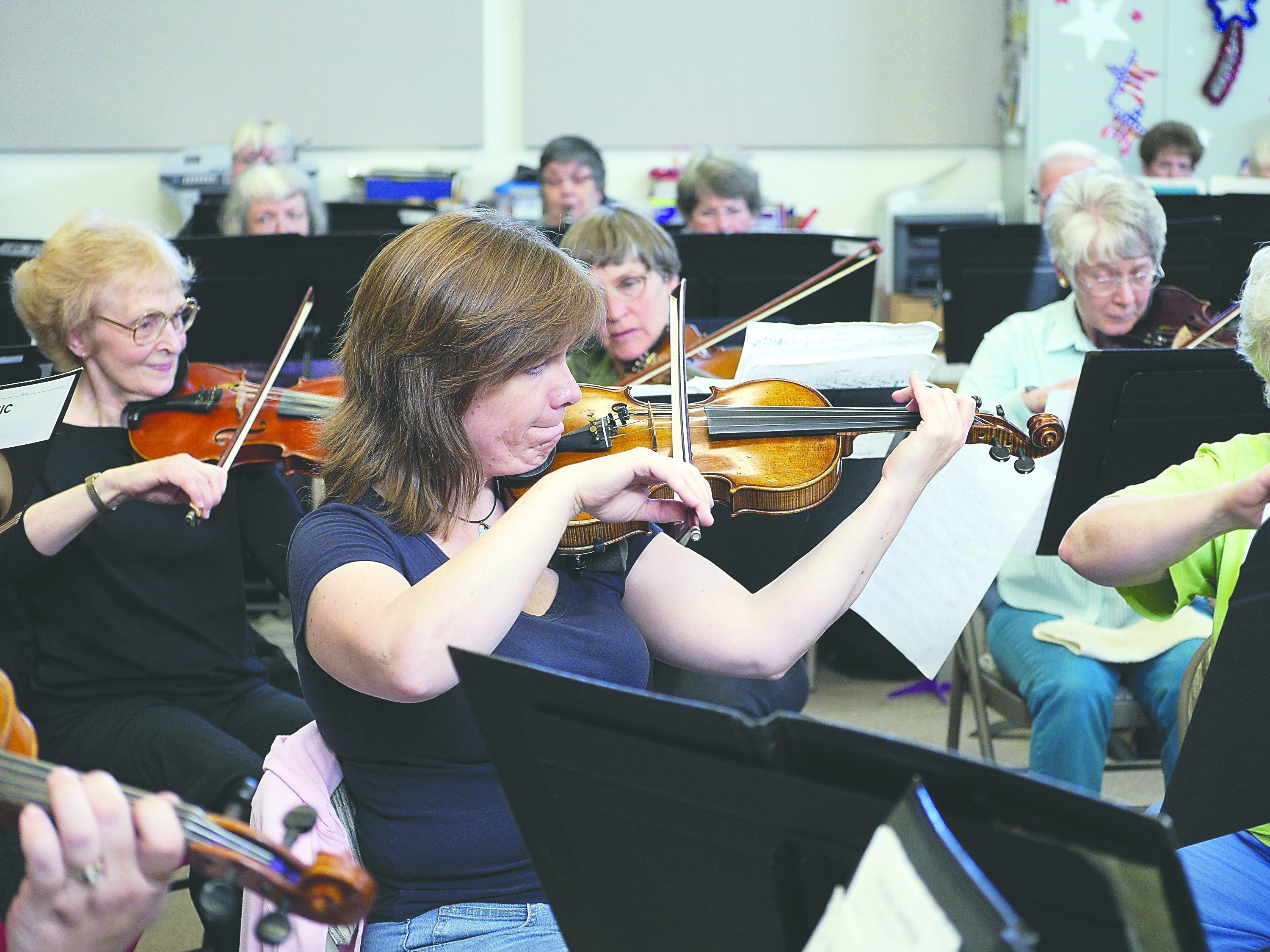 Sequim Community Orchestra members Ann Zimmerman