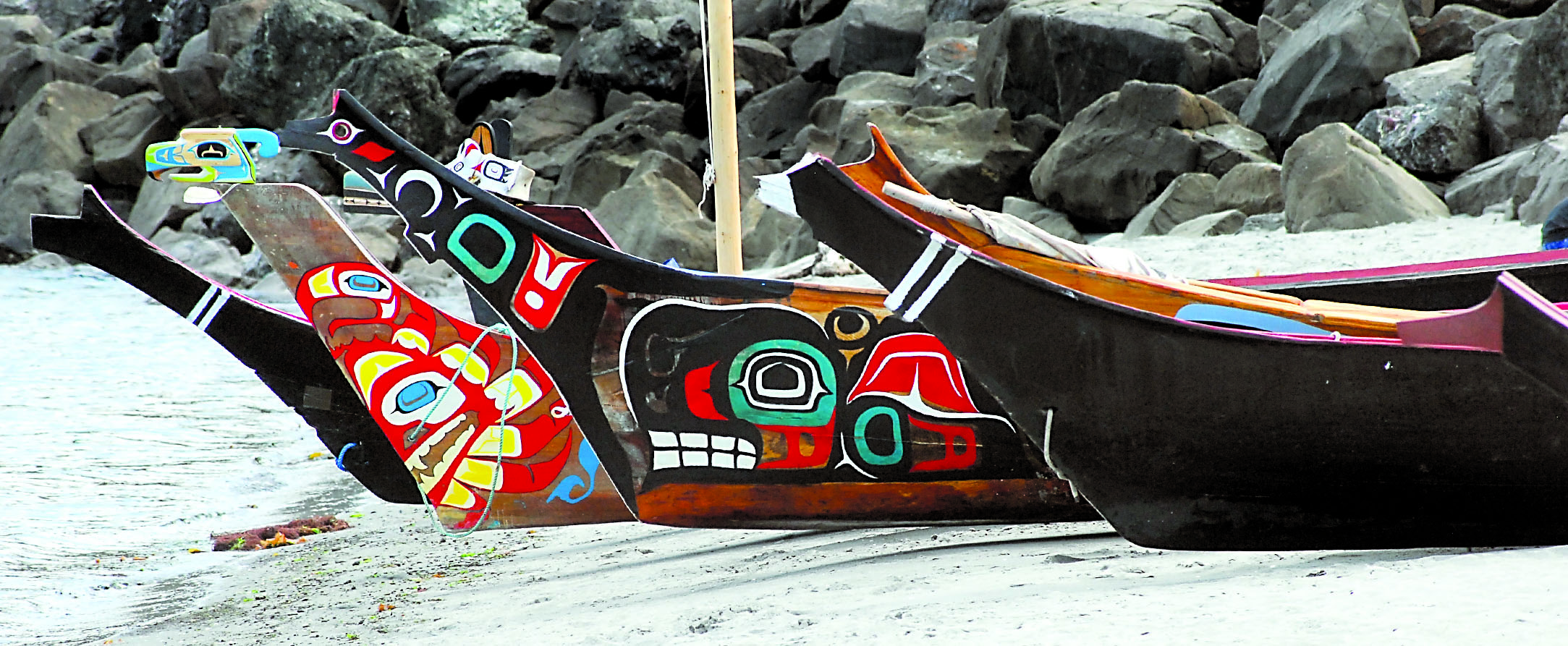 A collection of tribal canoes sits on Hollywood Beach in Port Angeles after participants in the 2012 Canoe Journey arrived Tuesday. Keith Thorpe/Peninsula Daily News