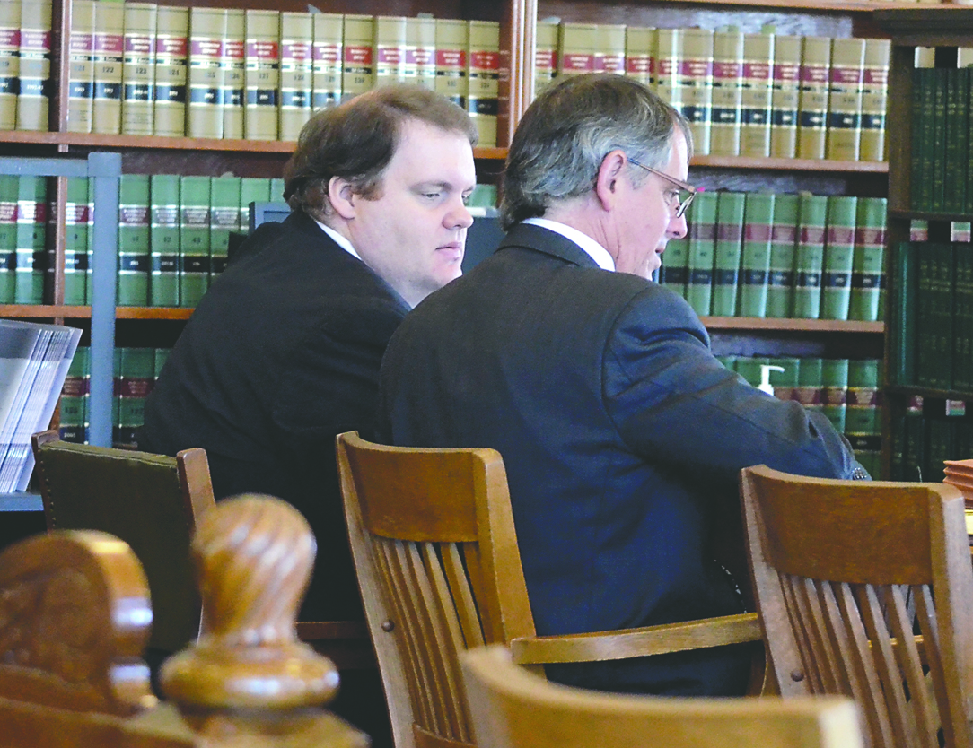 Michael Pierce is seen with his attorney