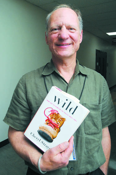 Jim Podlesny of Port Angeles met the author of "Wild" last week. Keith Thorpe/Peninsula Daily News