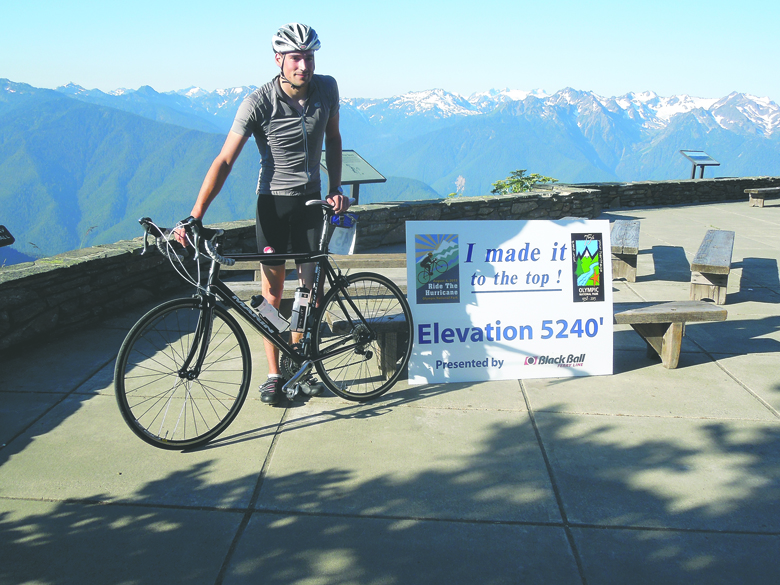 Lorne Guthro of Victoria was the first rider to the top in the 2013 Ride the Hurricane. He also was celebrating his birthday. Russ Veenema/Port Angeles Regional Chamber of Commerce