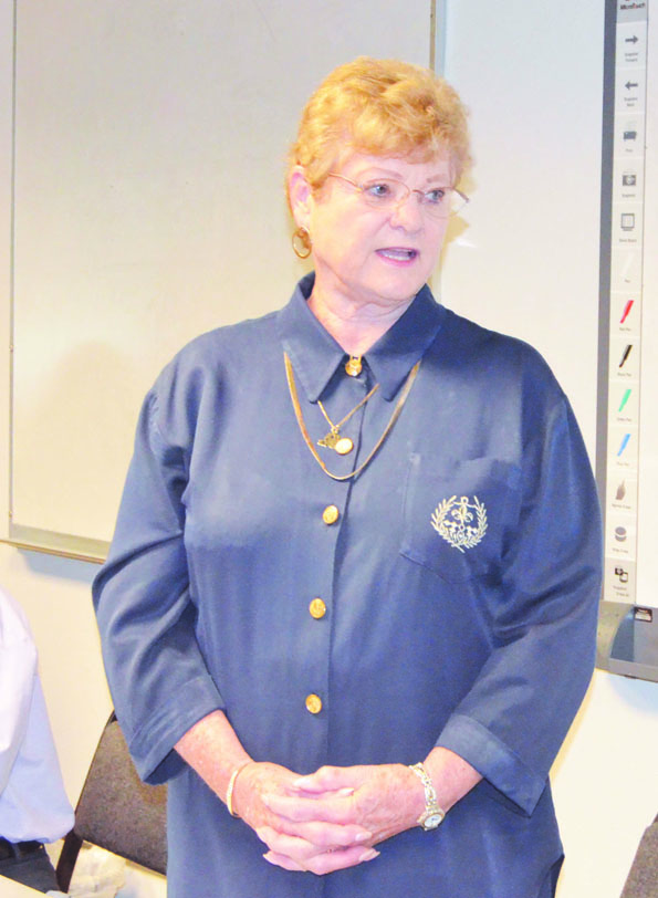 Judi Morris tells of her decision to stick with Bank of America on Monday. Charlie Bermant/Peninsula Daily News