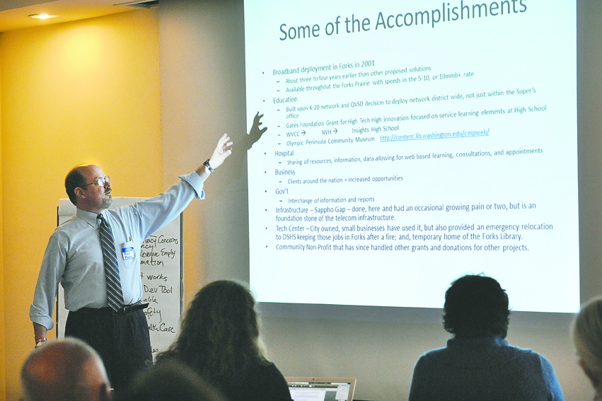 Forks City Attorney Rod Fleck discusses broadband service at a meeting last week in Forks on planning for extending access to rural areas. Lonnie Archibald/for Peninsula Daily News