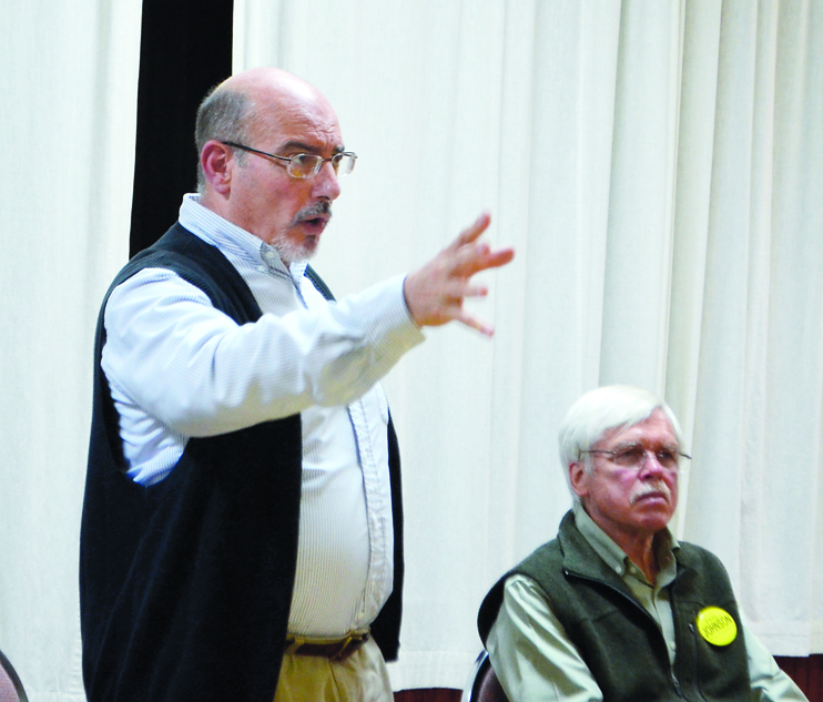 County Commissioner candidate Geoff Masci addresses the crowd at a Sept. 12 candidate forum in Chimacum while his opponent. Phil Johnson
