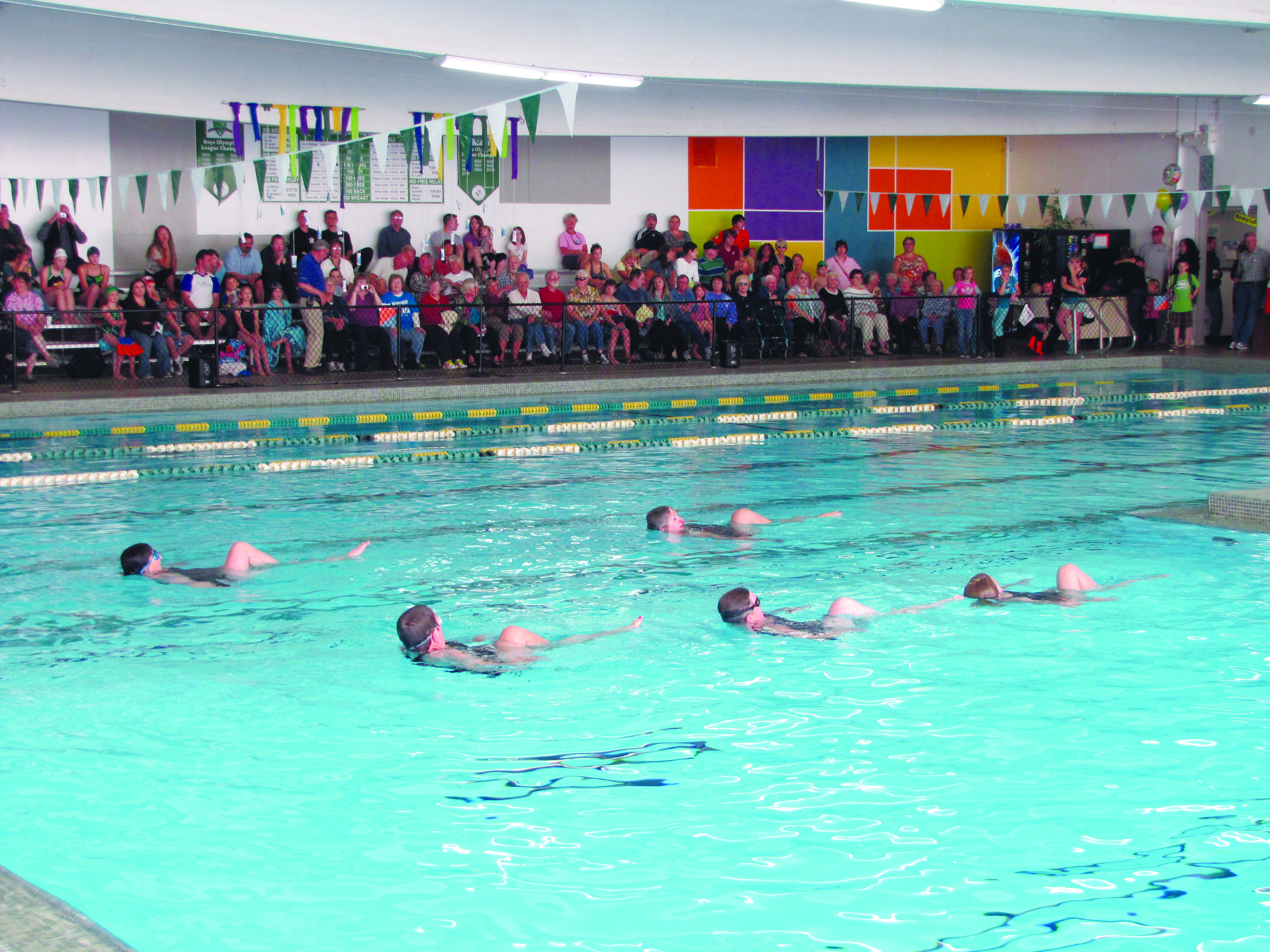 The William Shore Memorial Pool marks its 50th anniversary with synchronized swimming