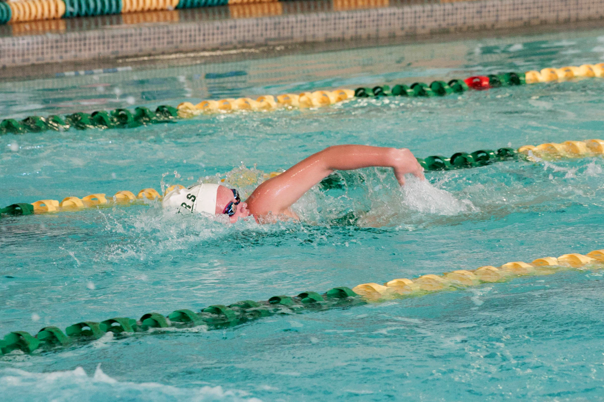 Port Angeles' Kylee Reid swims during Tuesday's meet with Bainbridge at William Shore Memorial Pool. Patty Reifenstahl