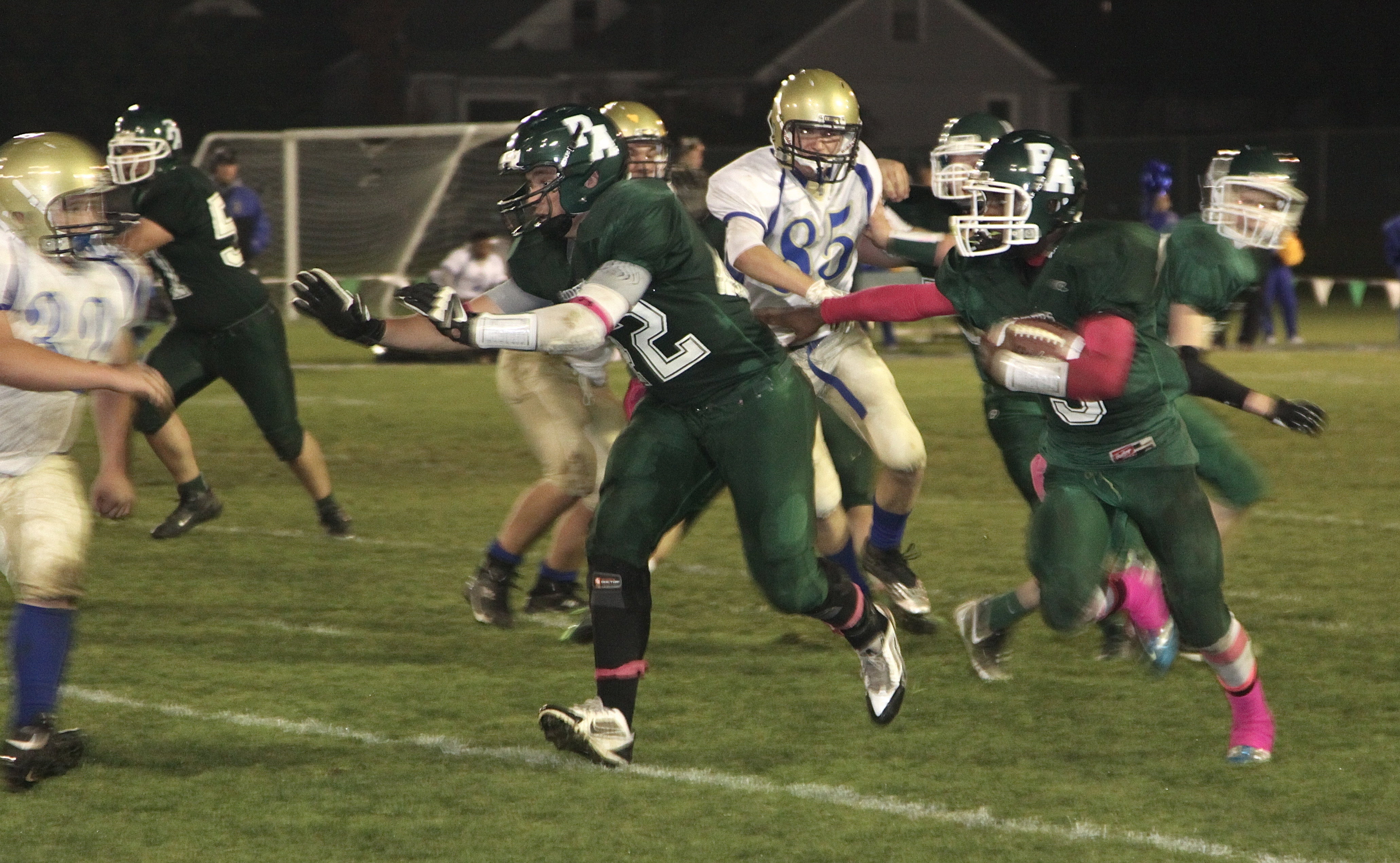 Port Angeles running back Miki Andrus follows blocker Nick Lasorsa upfield on an 8-yard gain in the third quarter of the Riders' 36-14 win over Bremerton Dave Logan/for Peninsula Daily News