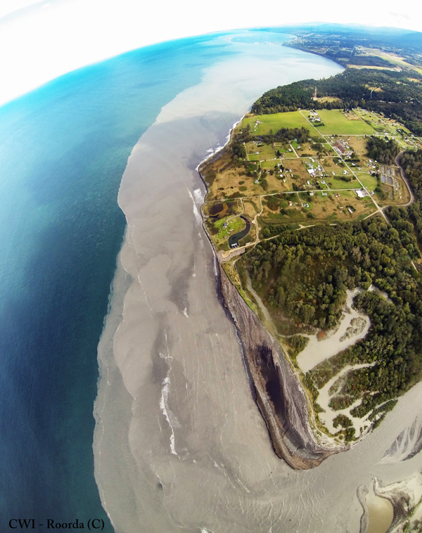 This aerial photo by pilot Tom Roorda (http://roordaaerial.com) taken Oct. 1 shows sediment from the Elwha River moving east in the Strait of Juan de Fuca toward Port Angeles and Ediz Hook. Copyright &Copy; 2013