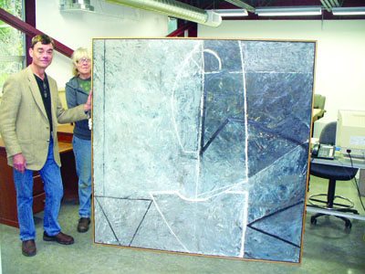 Greg Mitchell and Jefferson County Historical Society Collections Manager Becky Schurmann stand with "Ibex