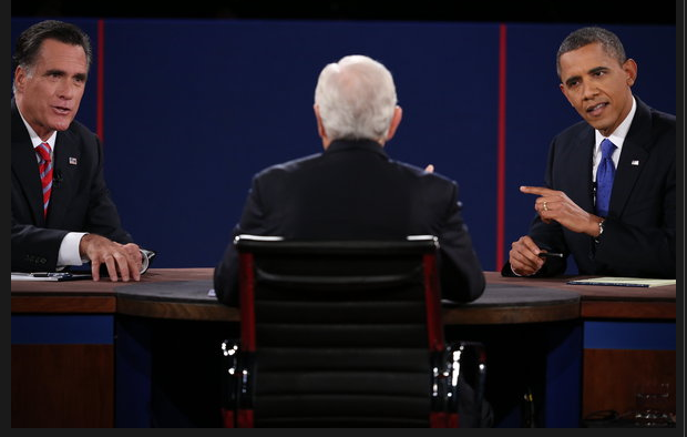 Republican presidential candidate Mitt Romney and President Obama debate as moderator Bob Schieffer of CBS listens Monday night. The Associated Press