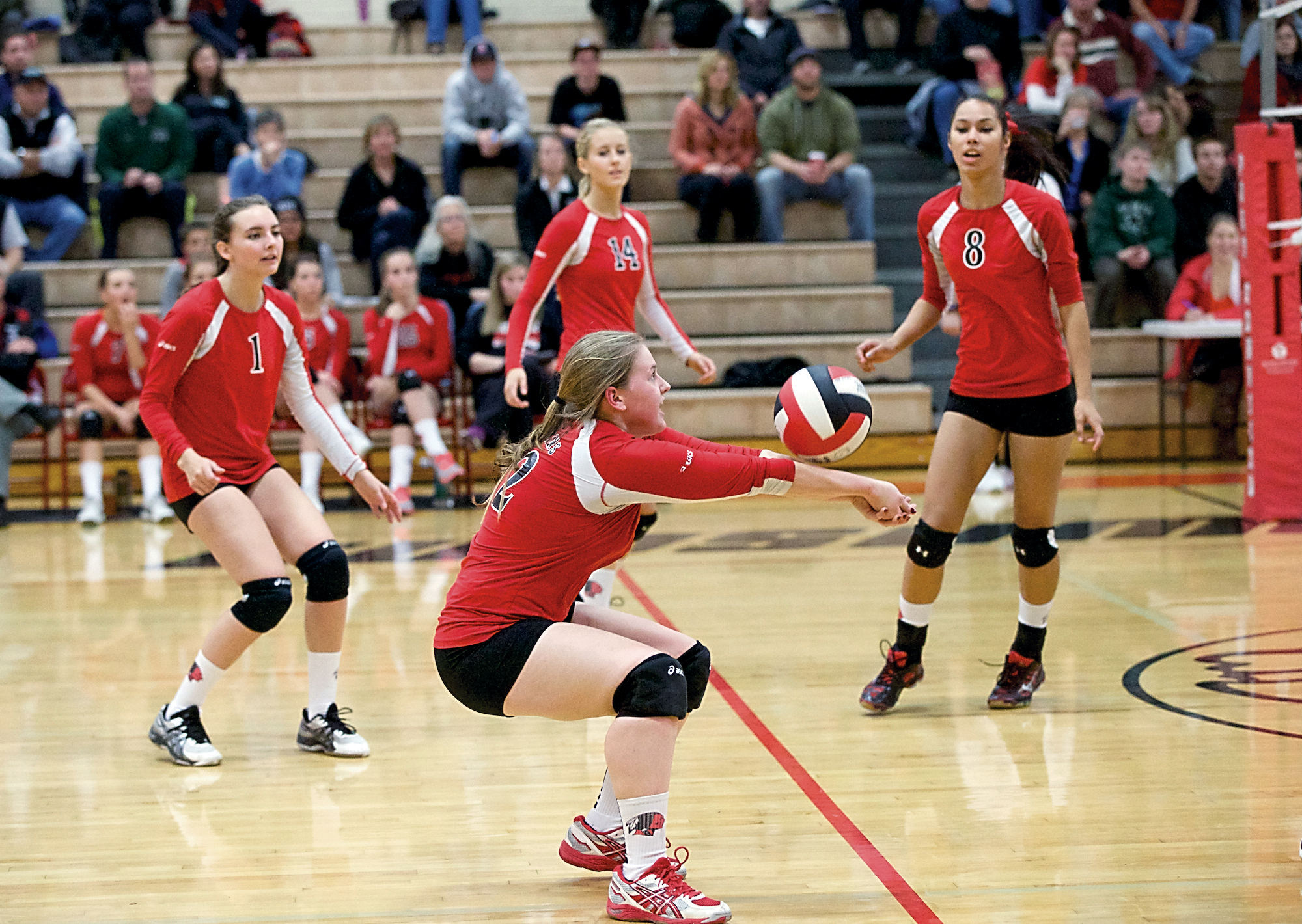 Port Townsend's Baili Shaw returns a serve during the Redskins' 1A Tri-District play-in match against Charles Wright Academy. Port Townsend lost in four sets. Steve Mullensky/for Peninsula Daily News