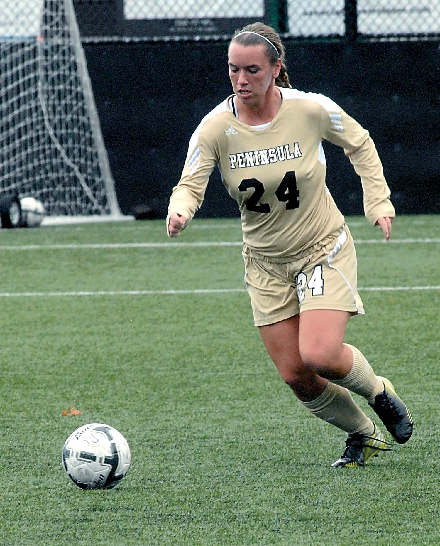Peninsula's Paxton Rodocker chases a loose ball during a match against Highline last month. Keith Thorpe/Peninsula Daily News