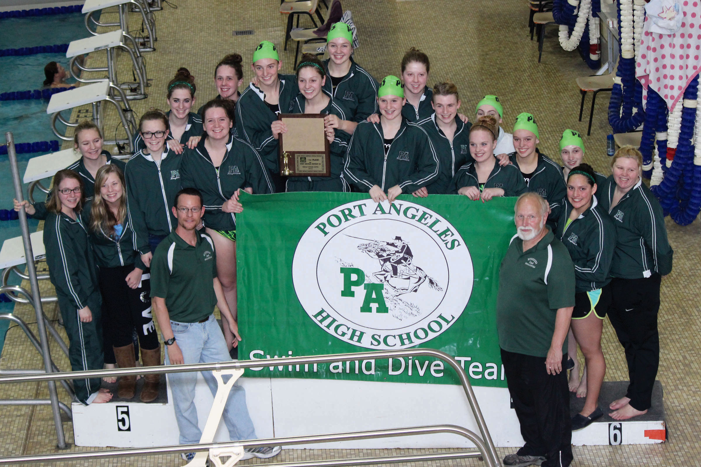 The Port Angeles girls swimming and diving team won its second straight West Central District championship at Hazen High School in Renton. The team is Izi Livesay