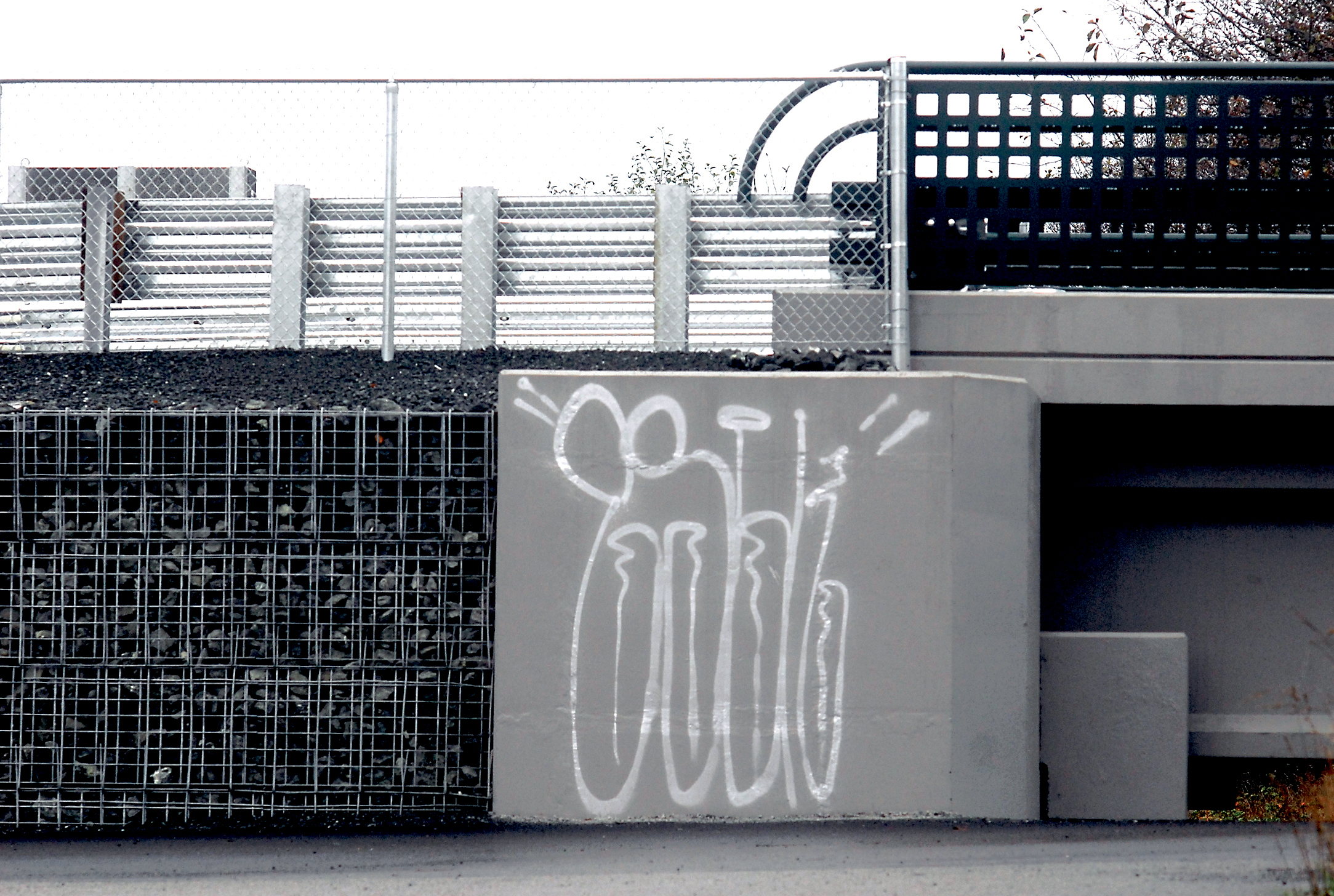 The base of a new bridge over Ennis Creek at the former Rayonier mill site in Port Angeles sits defaced by graffiti. Keith Thorpe/Peninsula Daily News