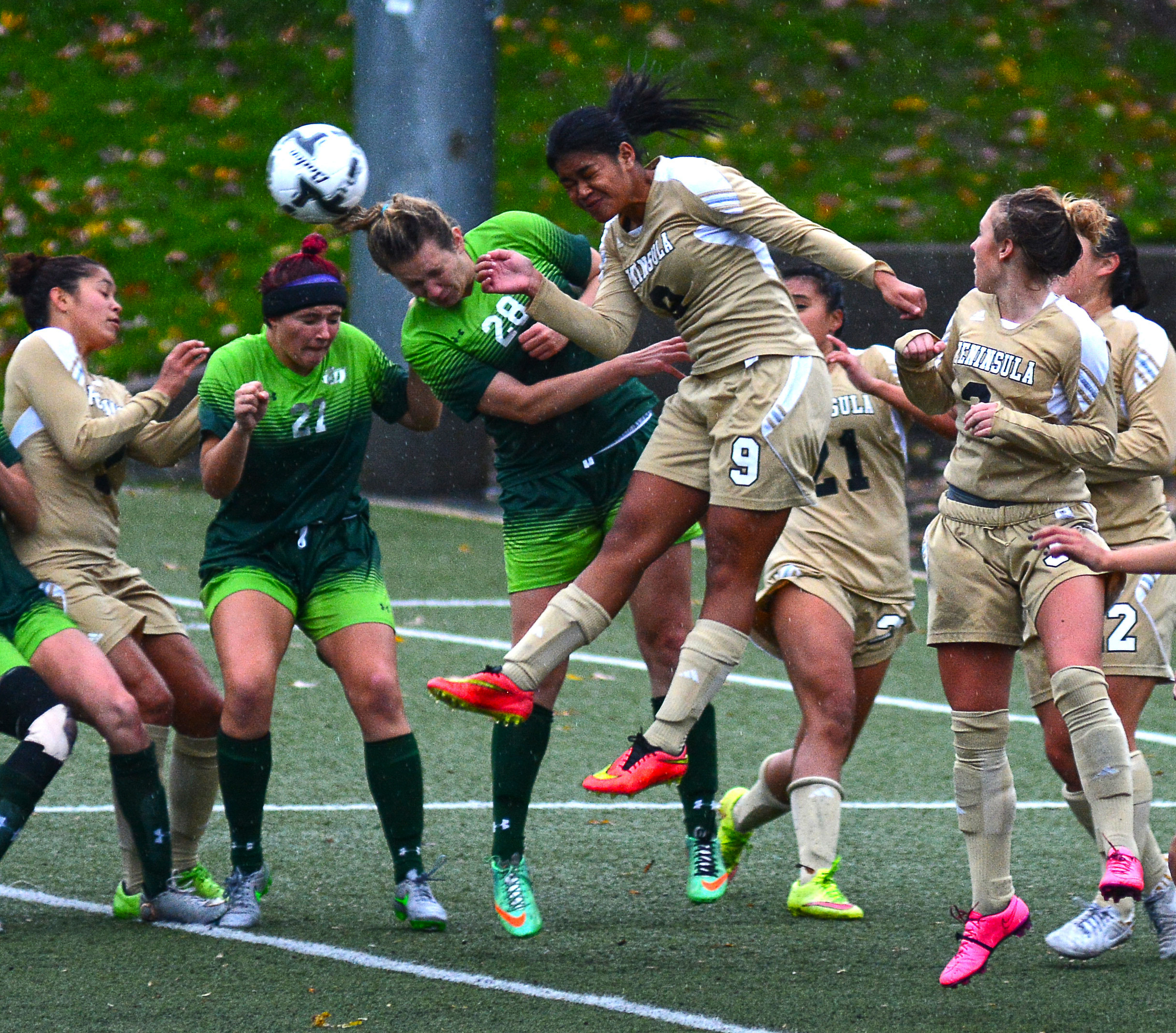 Peninsula's Tasha Inong (9) and Highline's Miranda Wolfe-Inman (28) go for a header in front of the Pirates' goal during the NWAC semifinals in Tukwila. Highline won 2-1 to bounce Peninsula from the playoffs. Jay Cline/for Peninsula Daily News