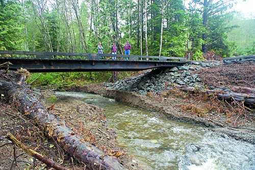 Makah Forestry Enterprises Operations Manager Jim Haney stands