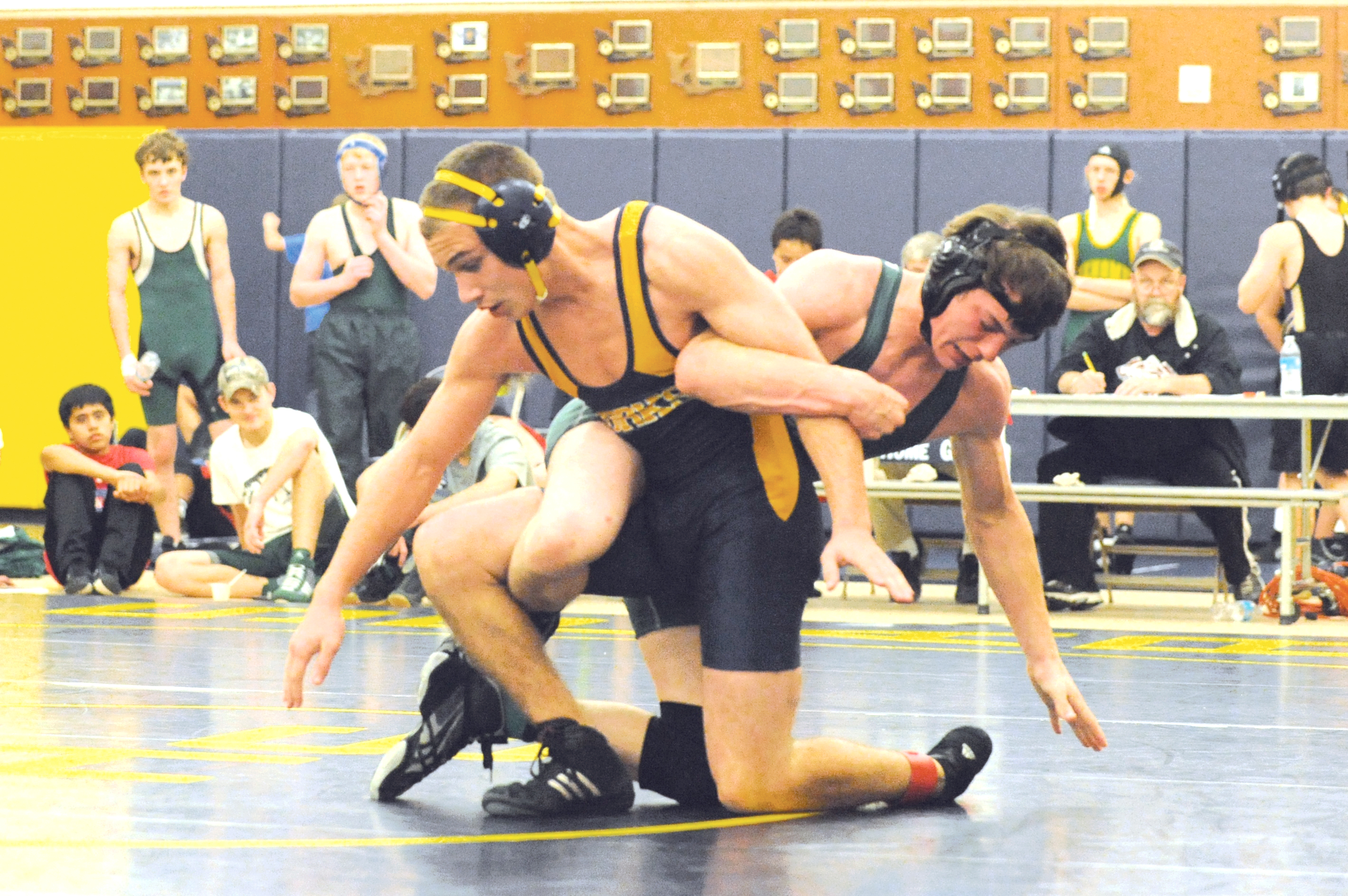 Forks' Kenny Gale and Brandyn Fouts of Port Angeles wrestle during the Forks Invite at Forks High School. Fouts went on to win the close match. Lonnie Archibald/for Peninsula Daily News