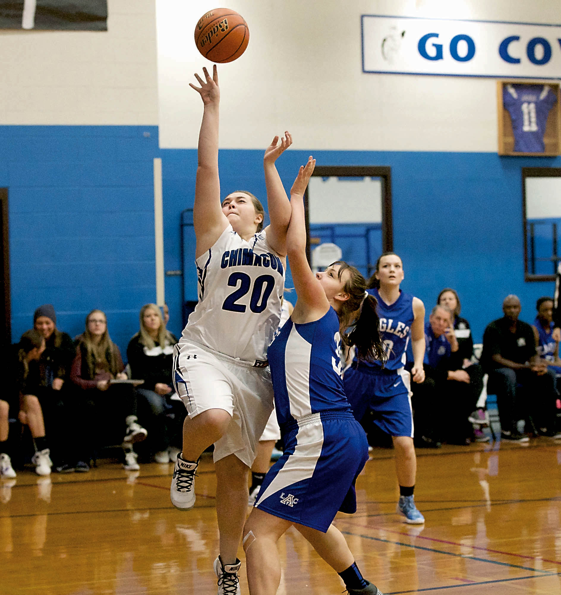 Chimacum's Madeline Nordberg (20) goes to the hoop during the Cowboys' Nisqually League loss to Life Christian Academy. Steve Mullensky/for Peninsula Daily News