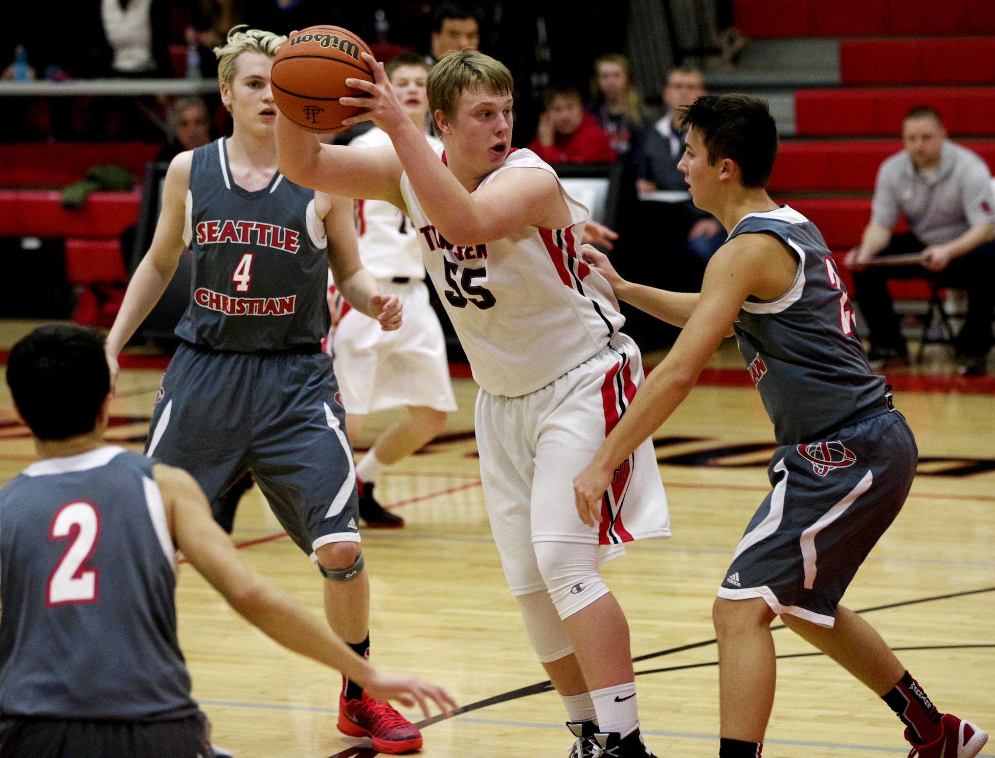 Port Townsend's Kaiden Parcher (55) is surrounded by the defense of Seattle Christian's Zac VanderLay