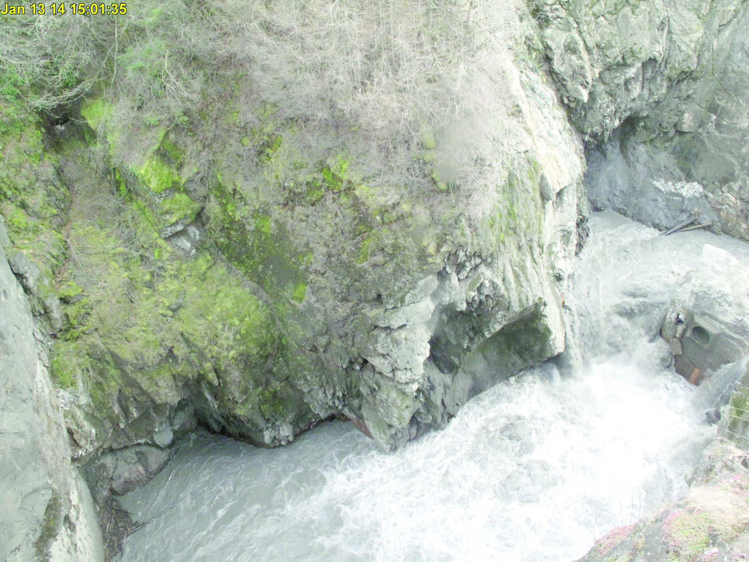 Remnants of the Glines Canyon Dam in a webcam image Monday. Blasting at the site is expected to resume this week. Olympic National Park webcam