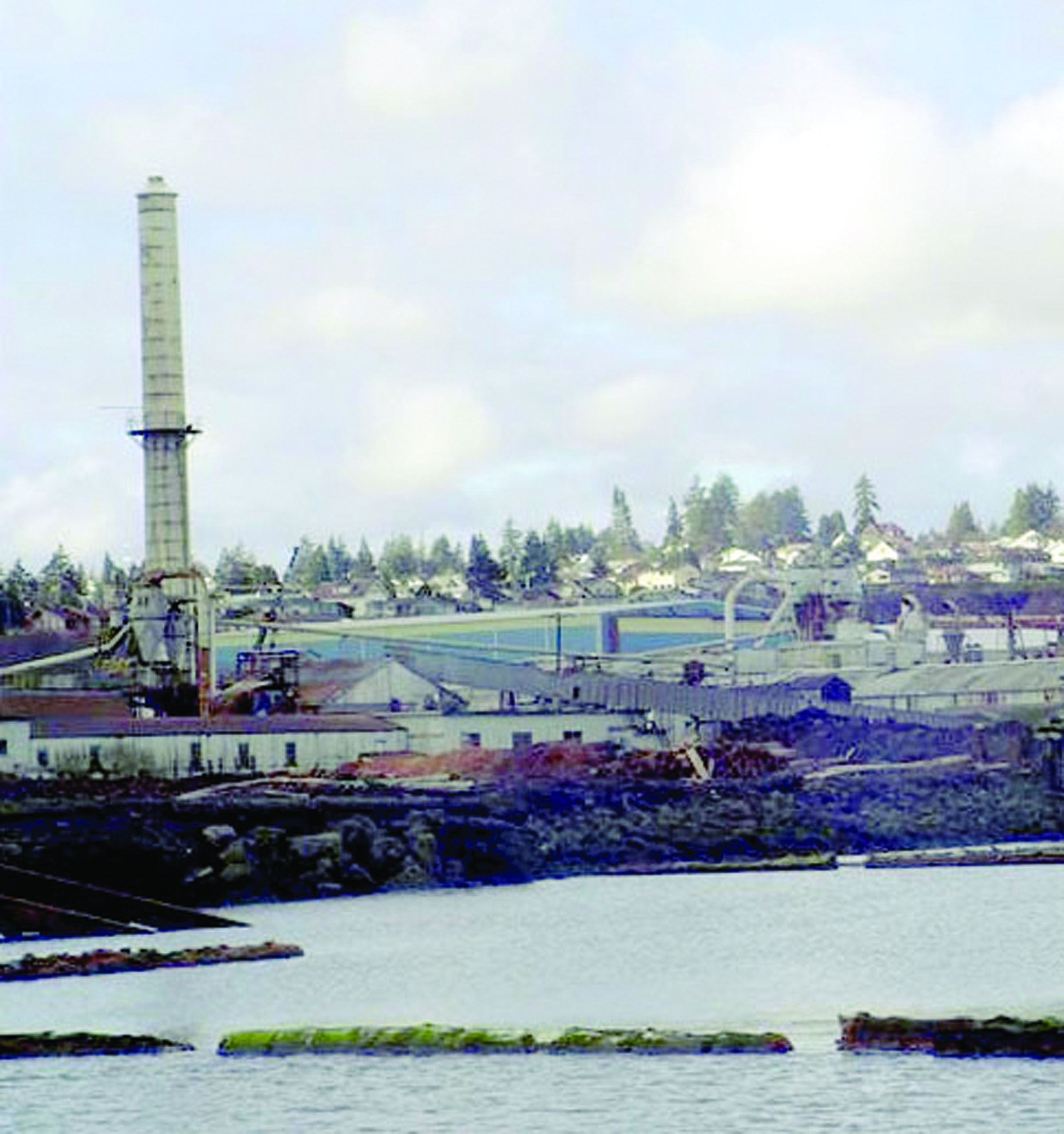 The 175-foot smokestack that towers over the former PenPly plywood mill is a landmark — but is it historical?