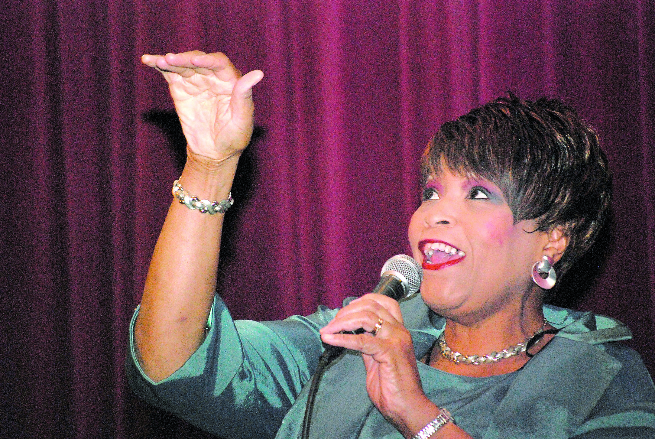 Debbie Wooten on stage at Peninsula College.  -- Photo by Diane Urbani de la Paz/Peninsula Daily News