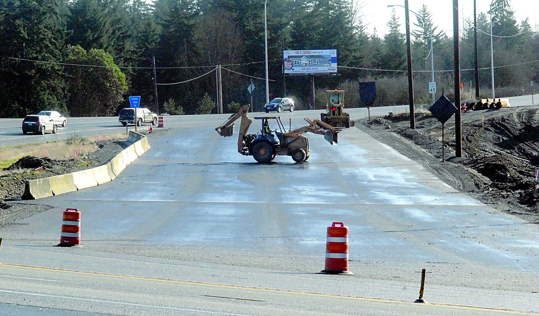 A front loader works at the detour for U.S. Highway 101 near Deer Park Road this week in preparation for diverting traffic around excavations for an underpass east of Port Angeles. — Keith Thorpe/Peninsula Daily News
