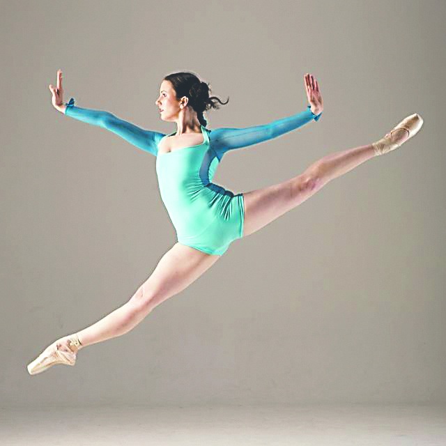 Ballerina Heather Wallace leaps from “Swan Lake” to “All You Need is Love” this season.  -- Photo by Ari Denison