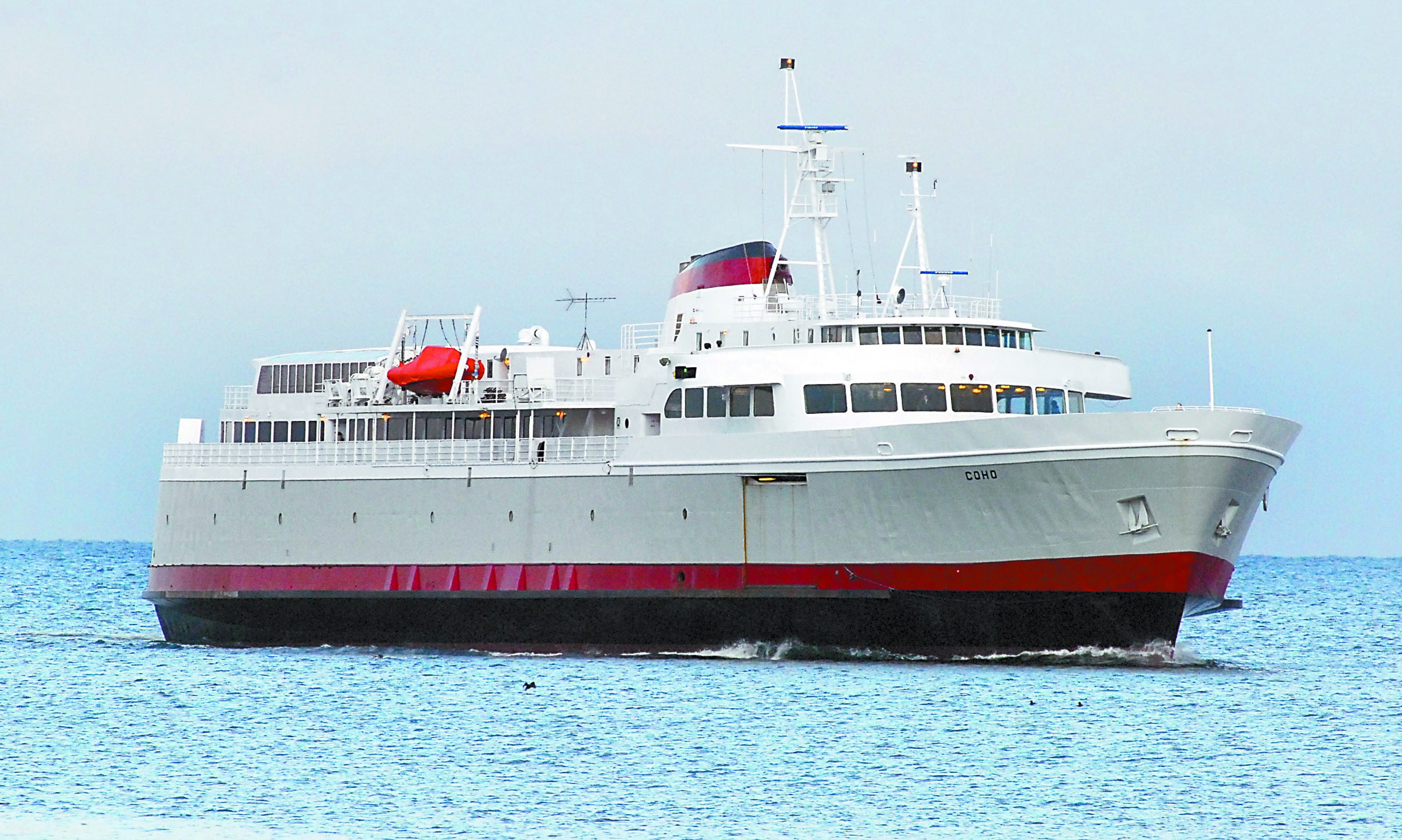 The auto/passenger ferry MV Coho approaches Port Angeles on its return trip from Victoria. The ship and its owner