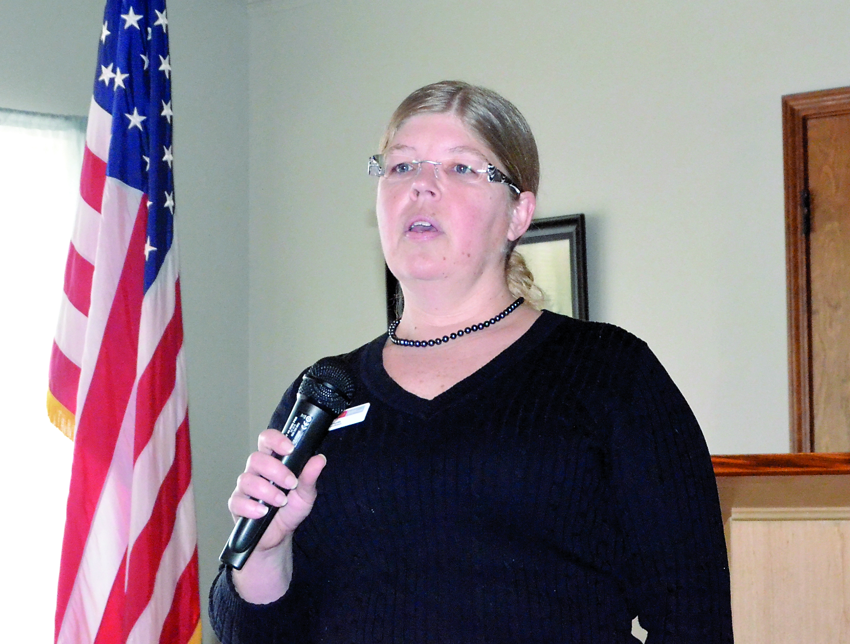 Wells Fargo Bank mortgage broker Emily Ingram addresses the Jefferson County Chamber of Commerce. — Charlie Bermant/Peninsula Daily News
