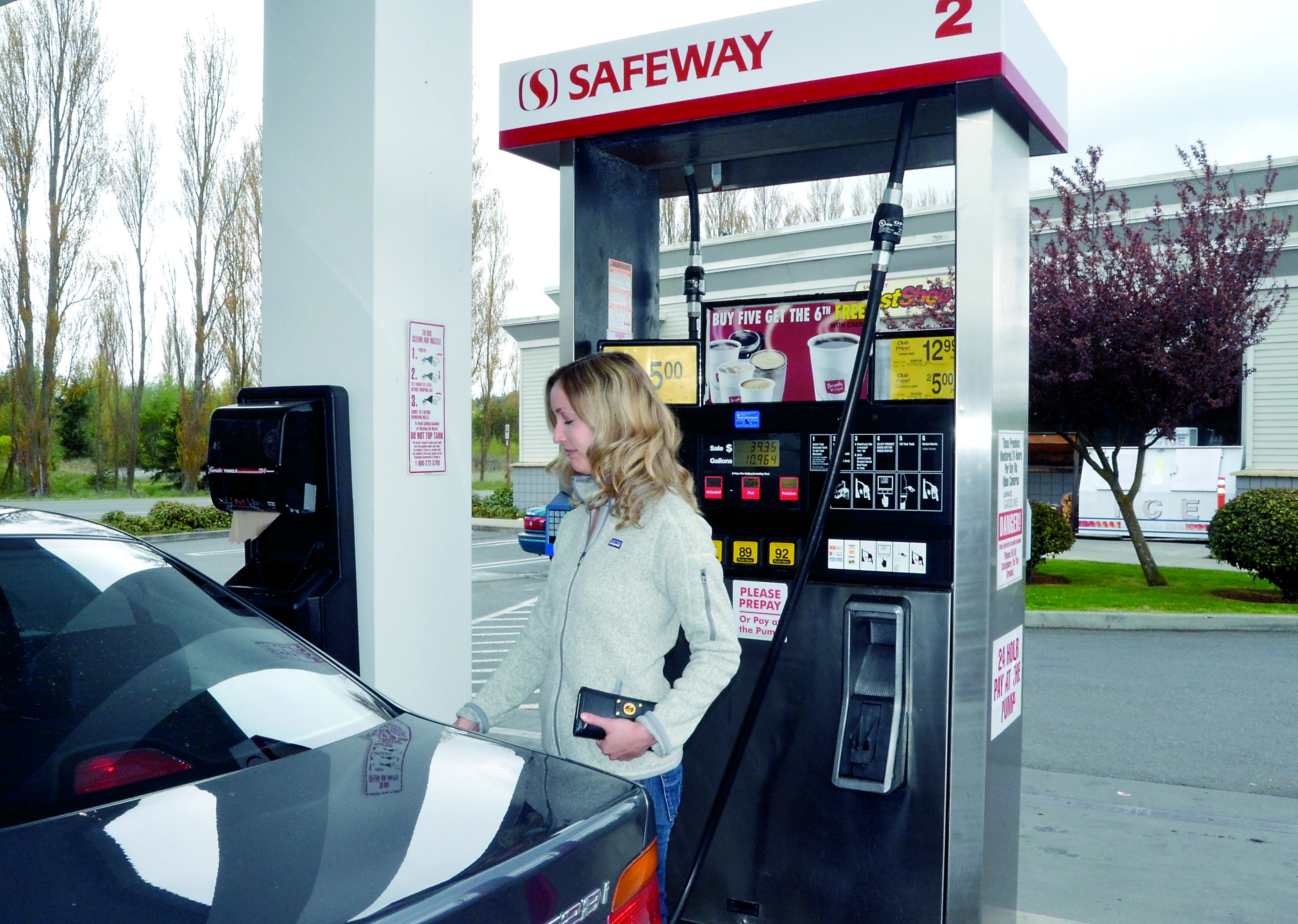 Grace Krabill pumps gas at the Port Townsend Safeway