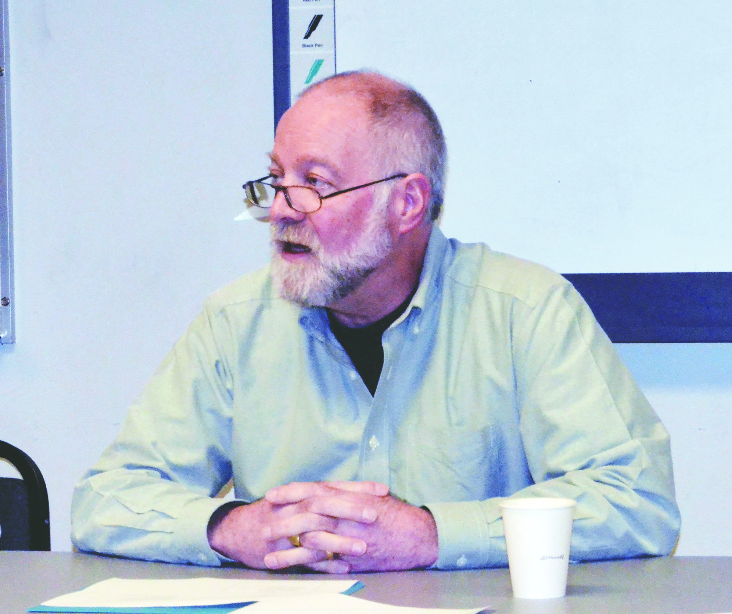 Peter Quinn addresses county commissioners on Monday. —Photo by Charlie Bermant/Peninsula Daily News
