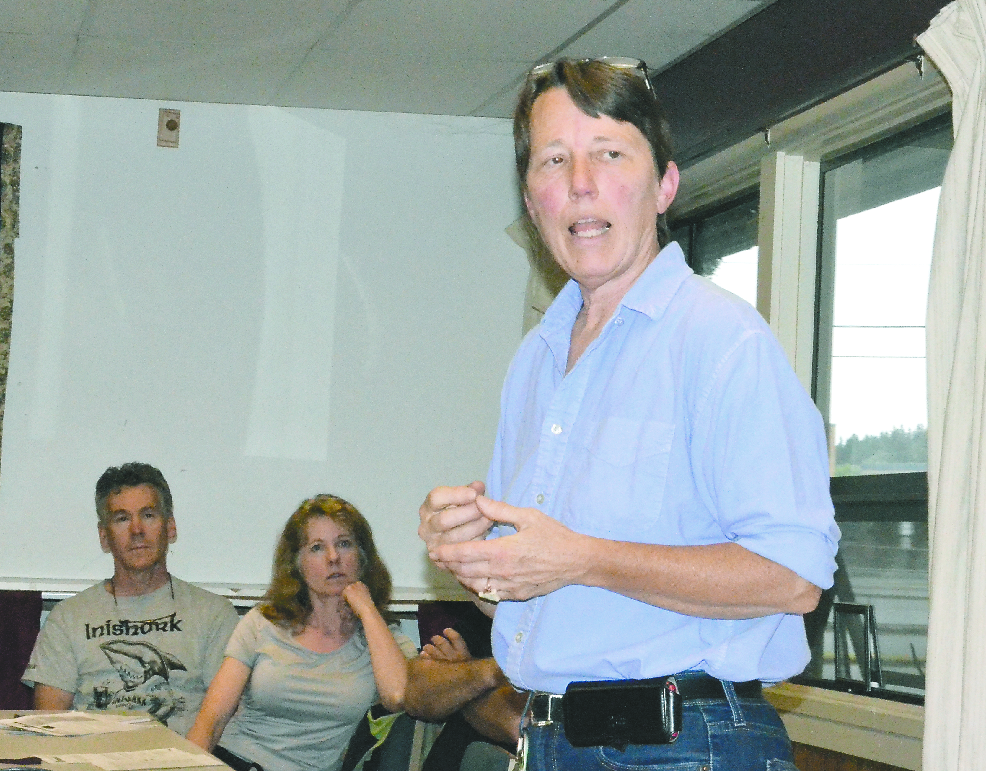 Karen Page addresses about 100 people Wednesday night