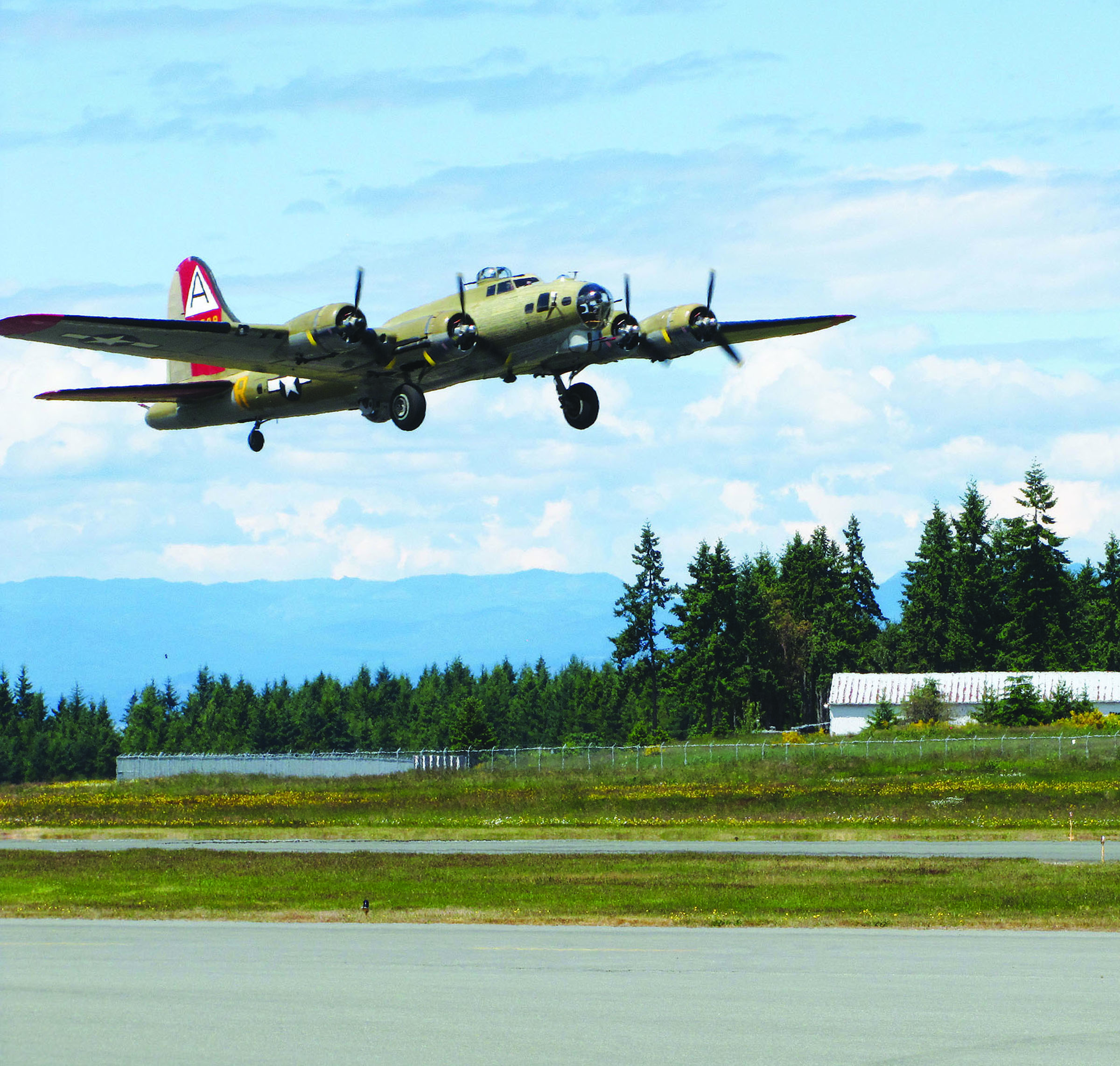 The visiting B-17 that’s part of Wings of Freedom lands Monday at William R. Fairchild International Airport -- Photo by Arwyn Rice/Peninsula Daily News