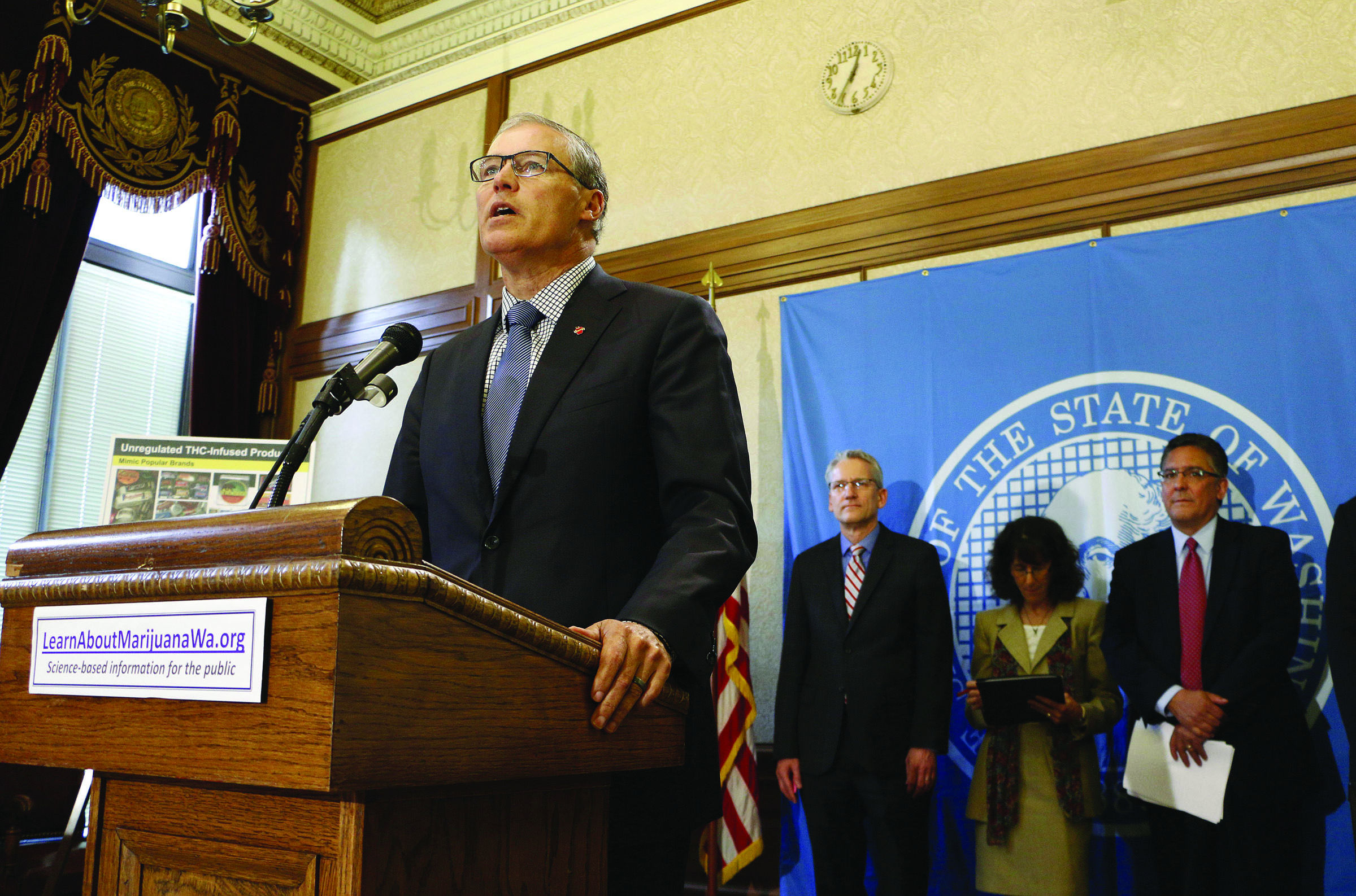 Gov. Jay Inslee speaks to the media Tuesday in Olympia about public awareness and safety efforts the state is making in advance of the start of retail sales of recreational marijuana. — The Associated Press