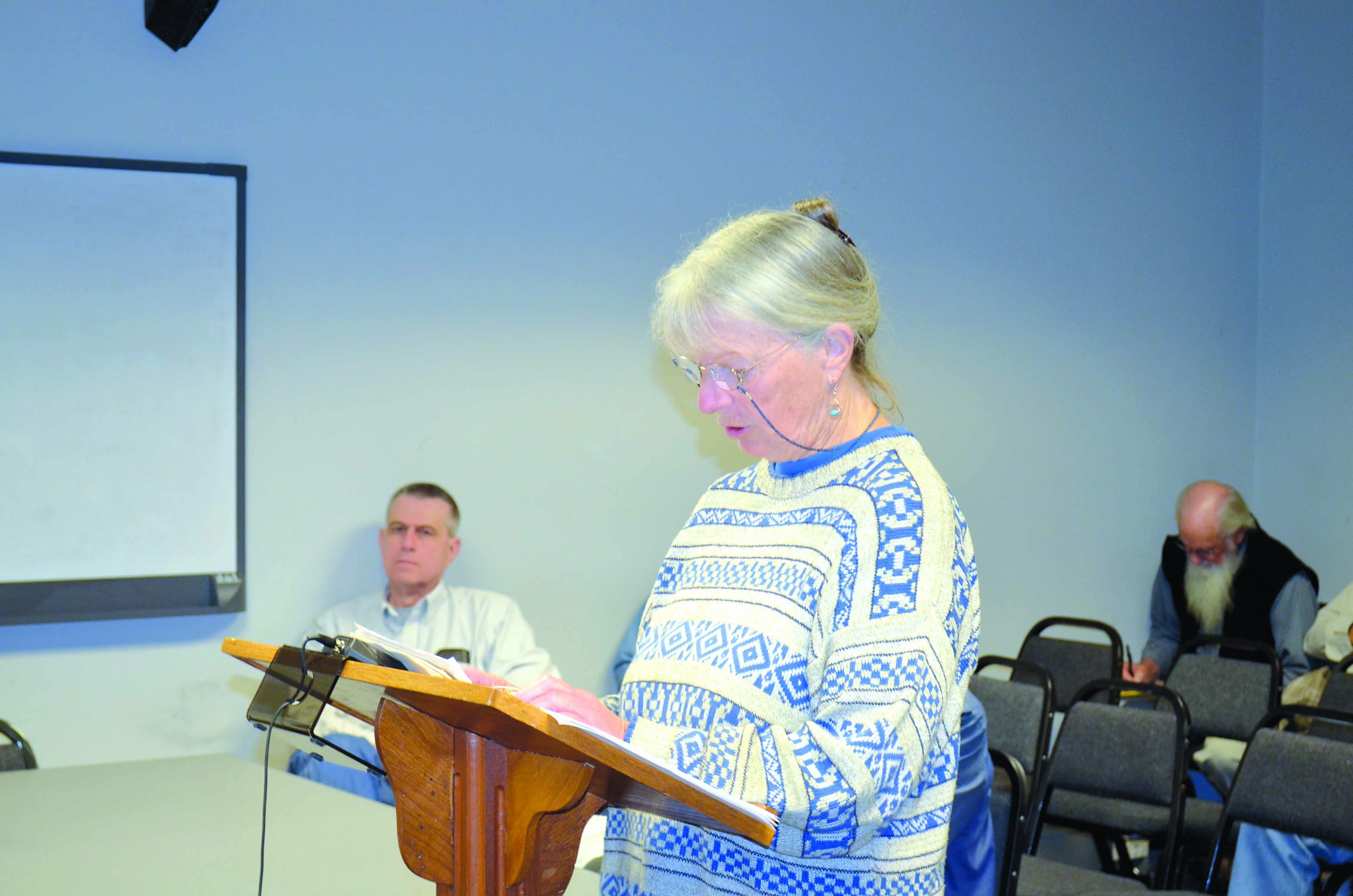 Gail Chatfield of Port Townsend addresses the Jefferson County commissioners to urge a ban on herbicide spraying.  -- Photo by Charlie Bermant/Peninsula Daily News