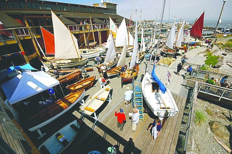 Participants display their boats in back of the Northwest Maritime Center in Port Townsend during the 2013 Pocket Yacht Palooza. This year's event takes place Saturday and Sunday. Marty Loken