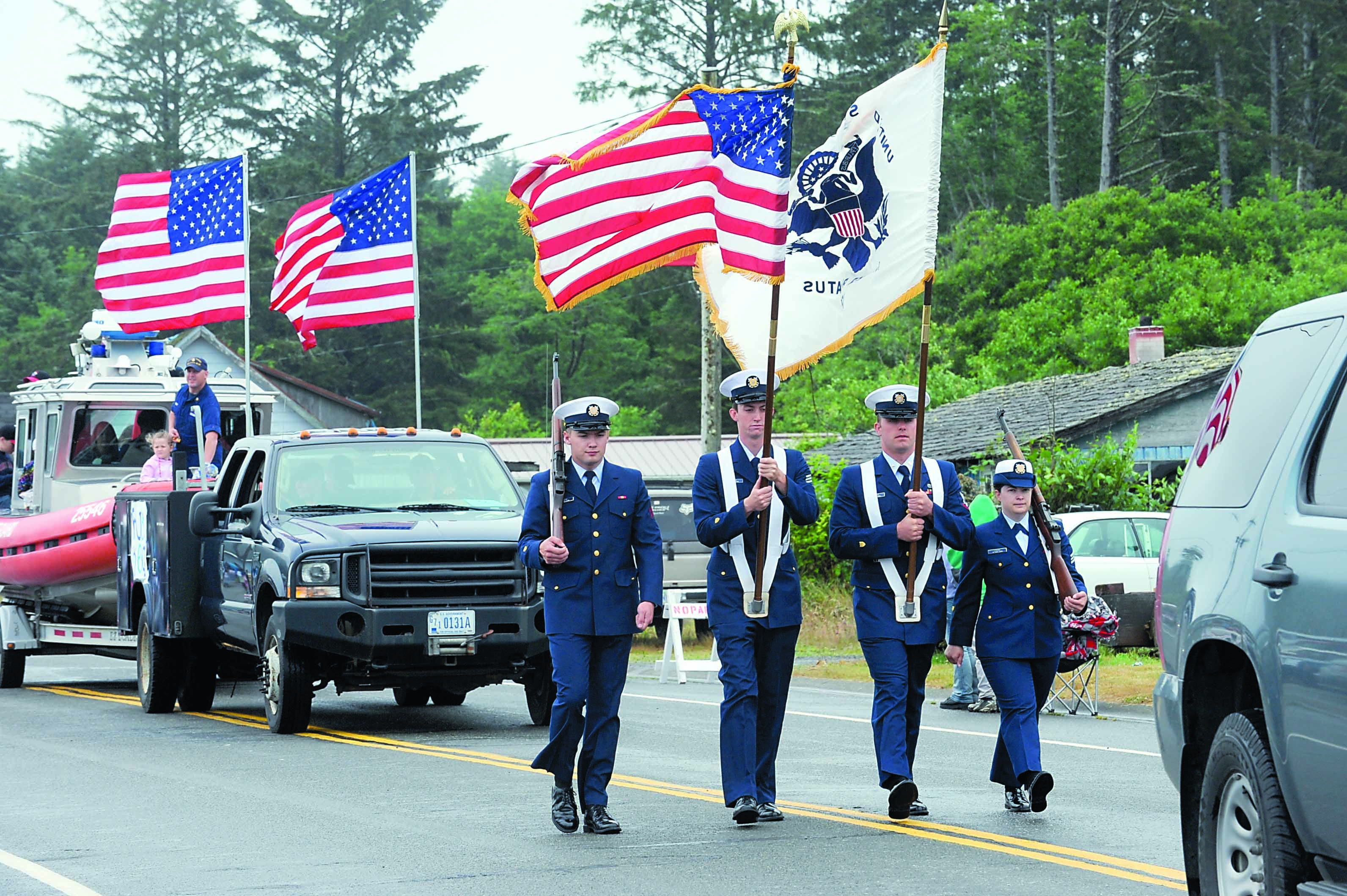 Members of the U.S. Coast Guard Quillayute Station in LaPush participate in 2011's Quileute Days Parade. Lonnie Archibald/for Peninsula Daily News