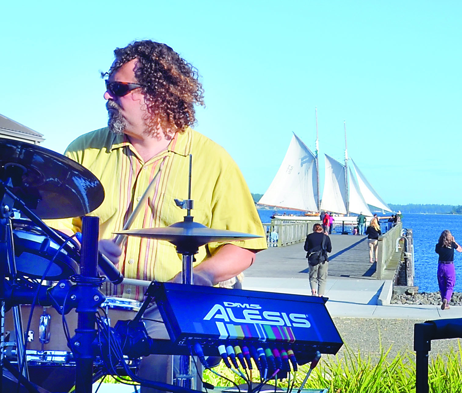 Frank DePalma plays the drums during last week’s Concert on the Dock as the schooner Adventuress arrives in Port Townsend.  -- Photo by Charlie Bermant/Peninsula Daily News
