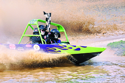 Paul and Josh Gahr take their victory lap in the TNT racing boat for the A-400 boat class at Extreme Sports Park in Port Angeles last September. Brian Harmon/for Peninsula Daily News