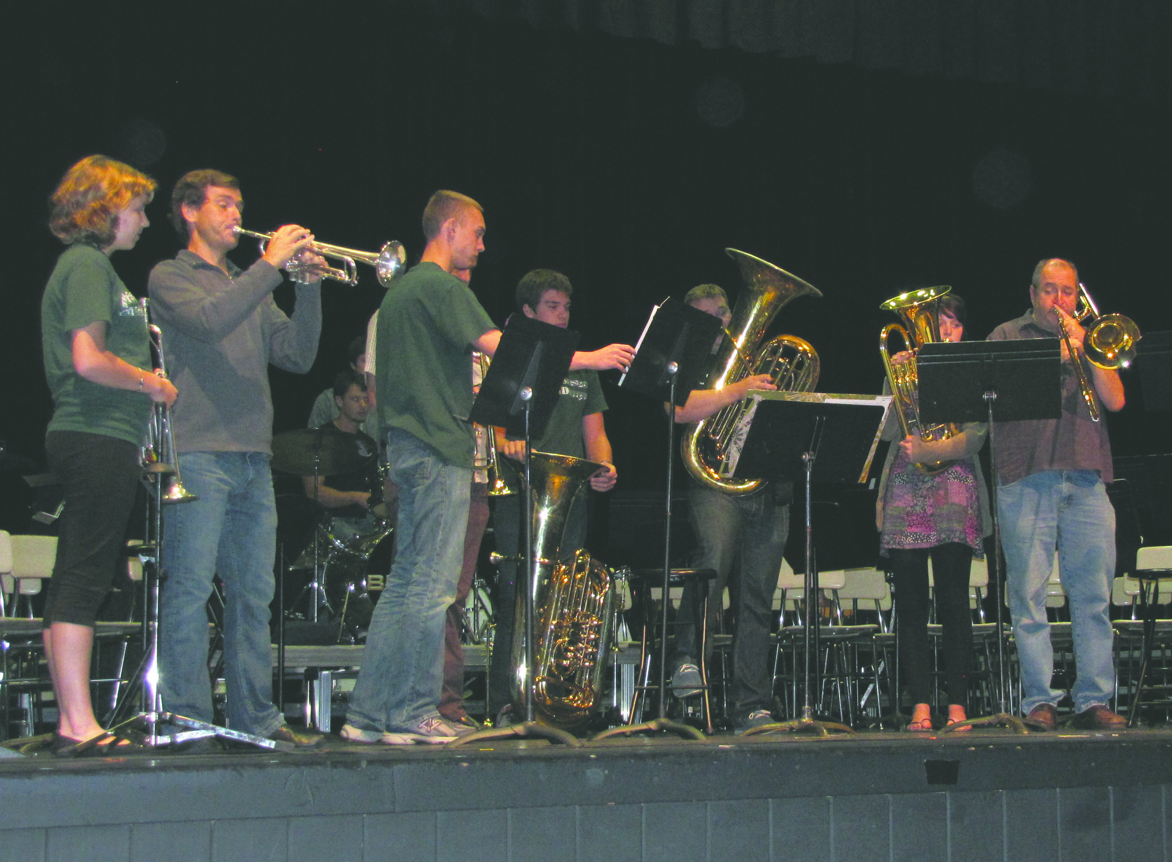 Members of Dallas Brass work with students from the Port Angeles High School Wind Ensemble on Sunday afternoon during a band clinic. Dallas Brass performed a concert later that evening